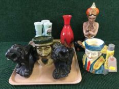 A hand painted three way spill vases, pair of chalk lions, character jugs,