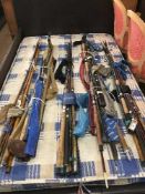 Five bundles of assorted fishing rods - split cane rods, boat rods, spinning rods,