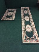 Four contemporary green floral rugs