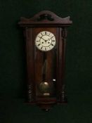 A Victorian mahogany Vienna wall clock,