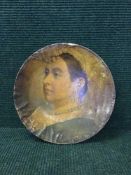 A Victorian papier mache plate depicting Queen Victoria