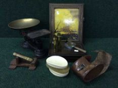 A tray of kitchen scales, brass shells, magnifying glass, drawing instrument case,
