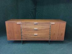 A Barker and Stonehouse rosewood effect sideboard with chrome handles