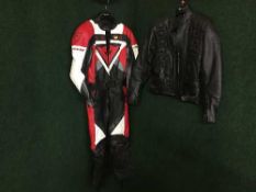 A set of Dainese motor bike leathers size 42 and a black leather jacket