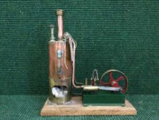 A live steam piston engine and boiler