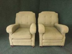 A pair of early 20th century Art Deco armchairs