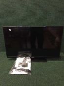 A Bush 32 inch LCD TV/DVD with remote