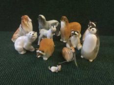 A tray of eleven china Russian figures - dogs,