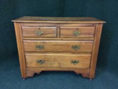 An Edwardian four drawer chest