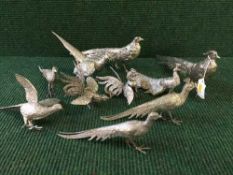 A tray of ten metal figures - pheasants and cockerils
