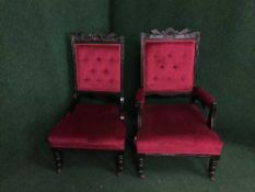 An Edwardian gents oak framed armchair with matching lady's chair