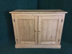 A stripped pine double door computer work station