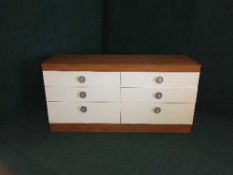 A late 20th century teak six drawer chest