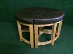 A set of four oak leather topped corner stools