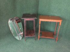 A frameless heart shaped mirror together with a barley twist occasional table and one other