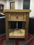 A reclaimed pine kitchen stand fitted with a drawer,