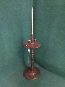 A late Victorian mahogany and brass standard lamp with shade