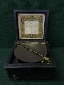 An early 20th century cased symphonium