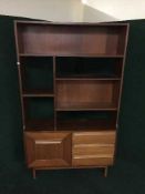 A mid 20th century twin section teak room divider