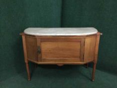 A mahogany marble topped washstand