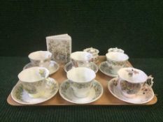 A tray of six Royal Doulton cups and saucers - seasons,