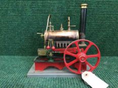 A live steam piston engine and boiler