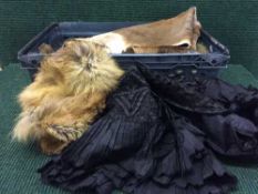 A lady's simulated fur coat, box of fur wraps, animal furs,