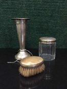 A loaded silver trumpet vase together with a silver topped glass pot and a silver mounted dressing