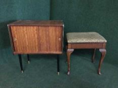 A mid 20th century teak record cabinet and an oak piano stool