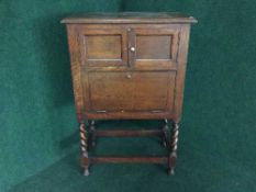 An oak barley twist gramophone cabinet