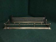 Two Victorian brass fire curbs