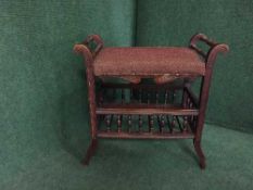 A Victorian mahogany piano stool