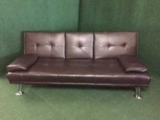 A pair of black vinyl upholstered bed settees