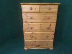 A pine six drawer chest