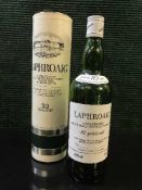 A bottle of Laphroaig Unblended Malt 10 Years Old Scotch Whisky (Factory sealed but level below
