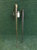 An early 20th century bayonet in scabbard