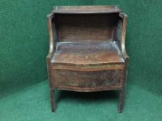 A Victorian inlaid mahogany commode