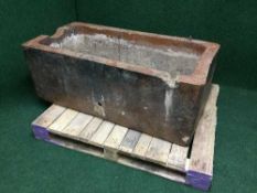 A large stone-glazed watering trough by J. Jameson & Son, Corbridge, approx 120 cm x 60 cm.