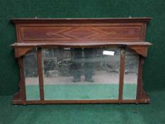 A Victorian inlaid mahogany over mantel mirror