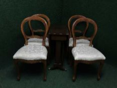 An inlaid mahogany drop leaf table and four balloon back chairs