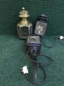 A tray of three early 20th century carriage lamps