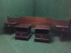 A mahogany stag minstral continental headboard and pair of bedside stands