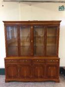 A yewwood four door bookcase