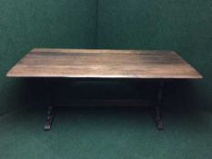 An oak refectory dining table