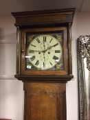 A 19th century oak long cased clock with painted dial J.