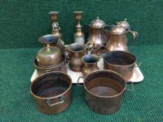 A tray of copper ware - candlesticks,