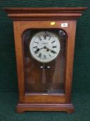 A large mahogany cased clock by Gent & Company Limited with pendulum and key