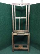 An early twentieth century oak hall stand
