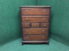 A mahogany stag seven drawer chest