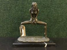 A bronze figure on stone base - Erotic study of standing lady.